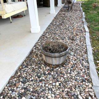 Small stones used in planter near front porch
