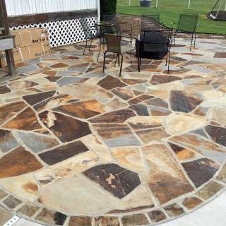Finished stone flooring in outdoor entertaining area