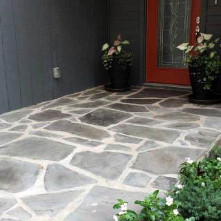 Grey stone leading to residential door